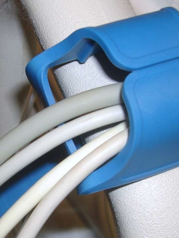 a blue JanaBand retaining several heavy duty cords and a call button